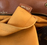 Cartera Monogram Cuero