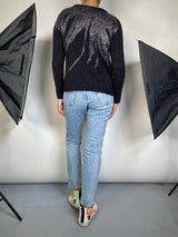 Sweater Negro Aplicaciones