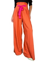 Pantalón Naranja Lazo Rosa