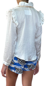 Blusa Blanca con Vuelos