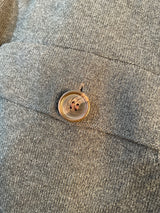 Sweater Gris Bolsillos