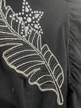 Polera Feathers