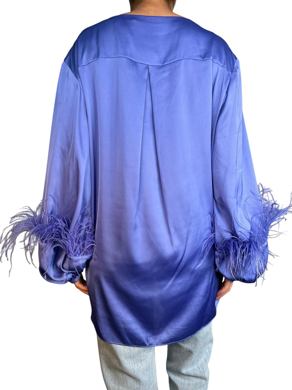 .Blusa Plumas