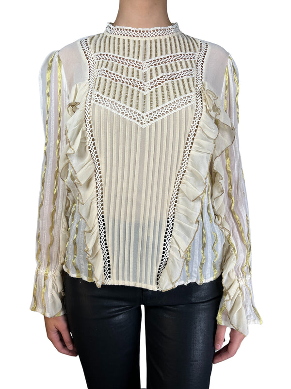 Blusa detalles dorados