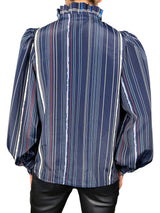 Blusa cuello alto con vuelos