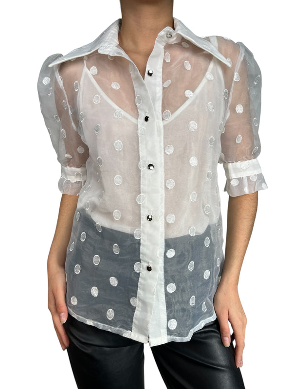 Blusa traslúcida