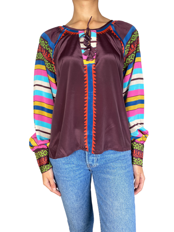 Blusa Okon Sekou