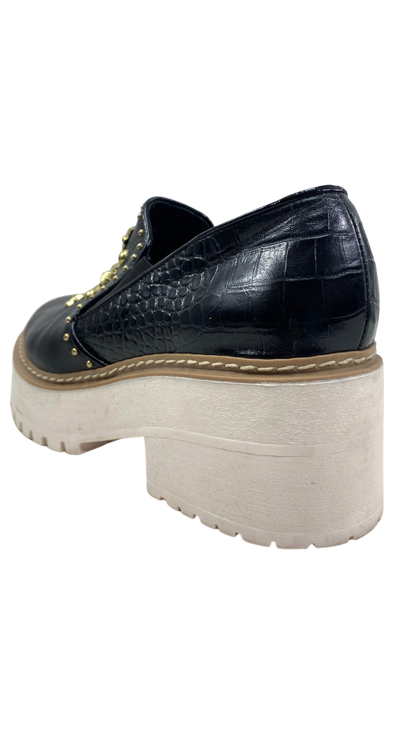 Zapato Tachas