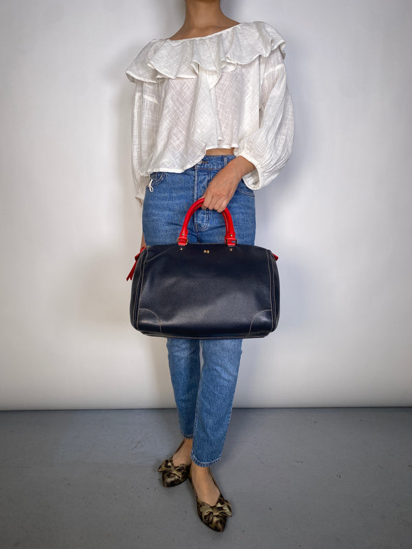 Cartera Asas Rojas