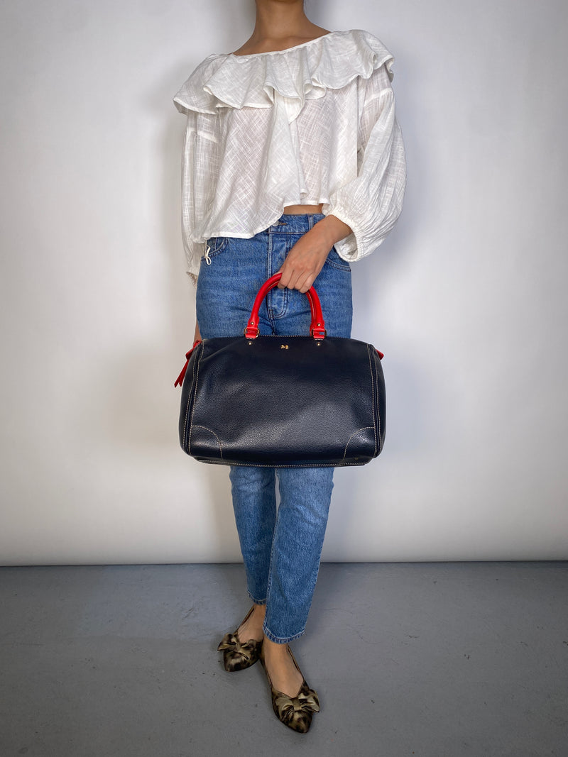 Cartera Asas Rojas