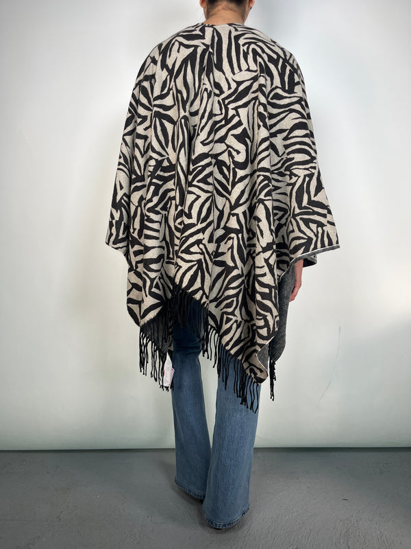 Poncho Flecos