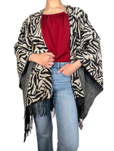 Poncho Flecos