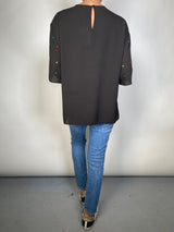 Blusa Aplicaciones
